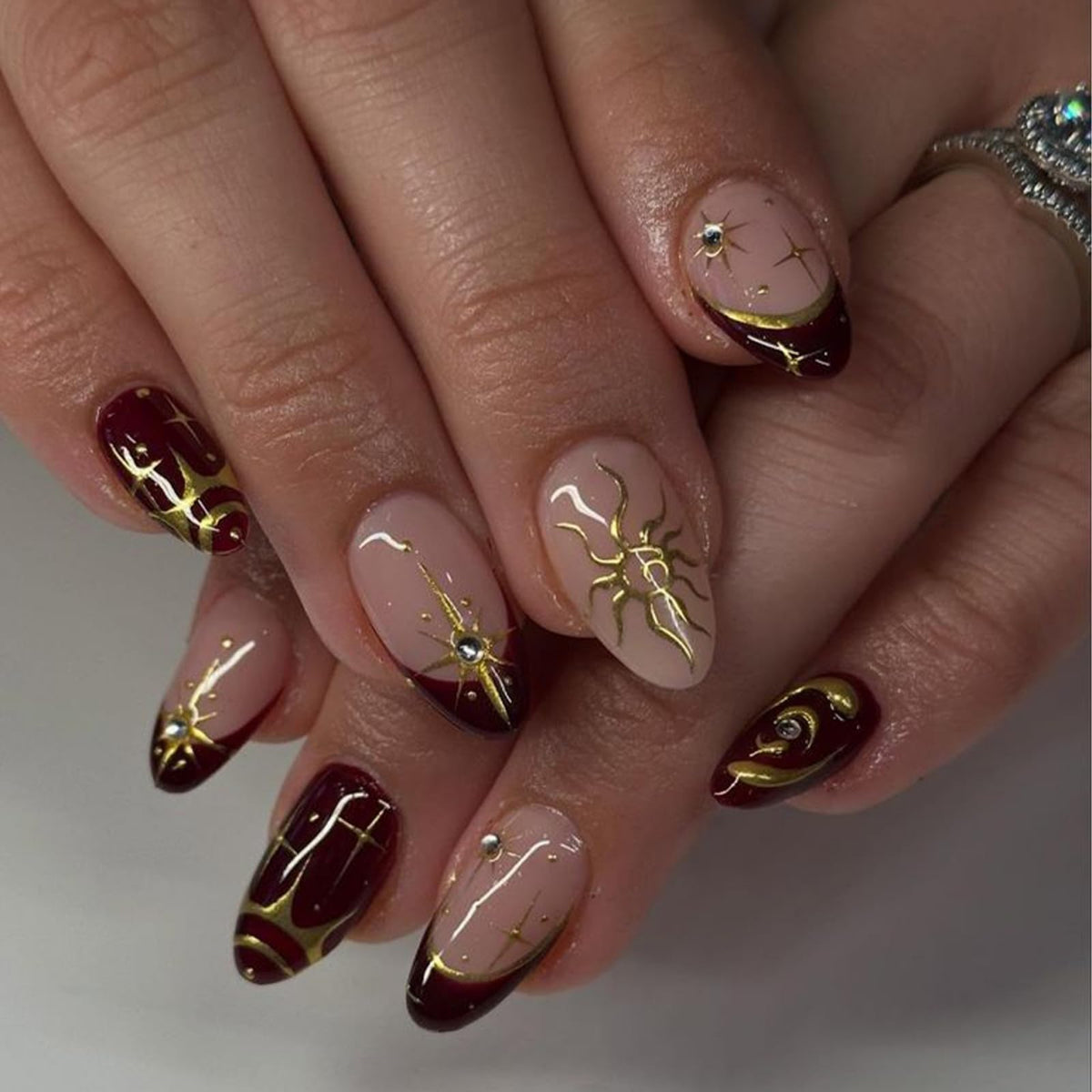 Silver Glitter Press on Nails French Tip Fake Nails Medium Almond False Nail with Rhinestone Design Nude Glossy Artificial Acrylic Full Cover Diamond Glue on Nail for Women Christmas Manicure 24Pcs