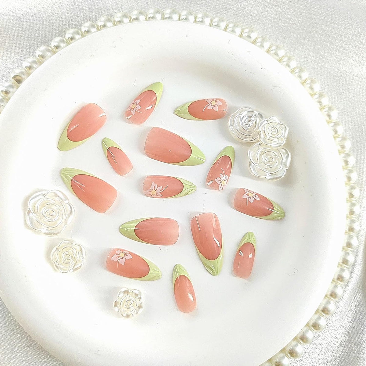 Spring Press on Nails Almond Medium Fake Nails with White Flower Designs French Tip Nails Press ons Light Green False Nails Glossy Glue on Nails Acrylic Nails Nude Stick on Nails for Women 24Pcs