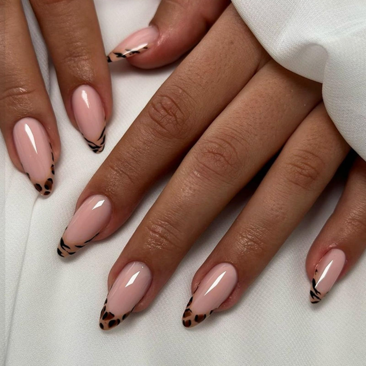 Silver Glitter Press on Nails French Tip Fake Nails Medium Almond False Nail with Rhinestone Design Nude Glossy Artificial Acrylic Full Cover Diamond Glue on Nail for Women Christmas Manicure 24Pcs