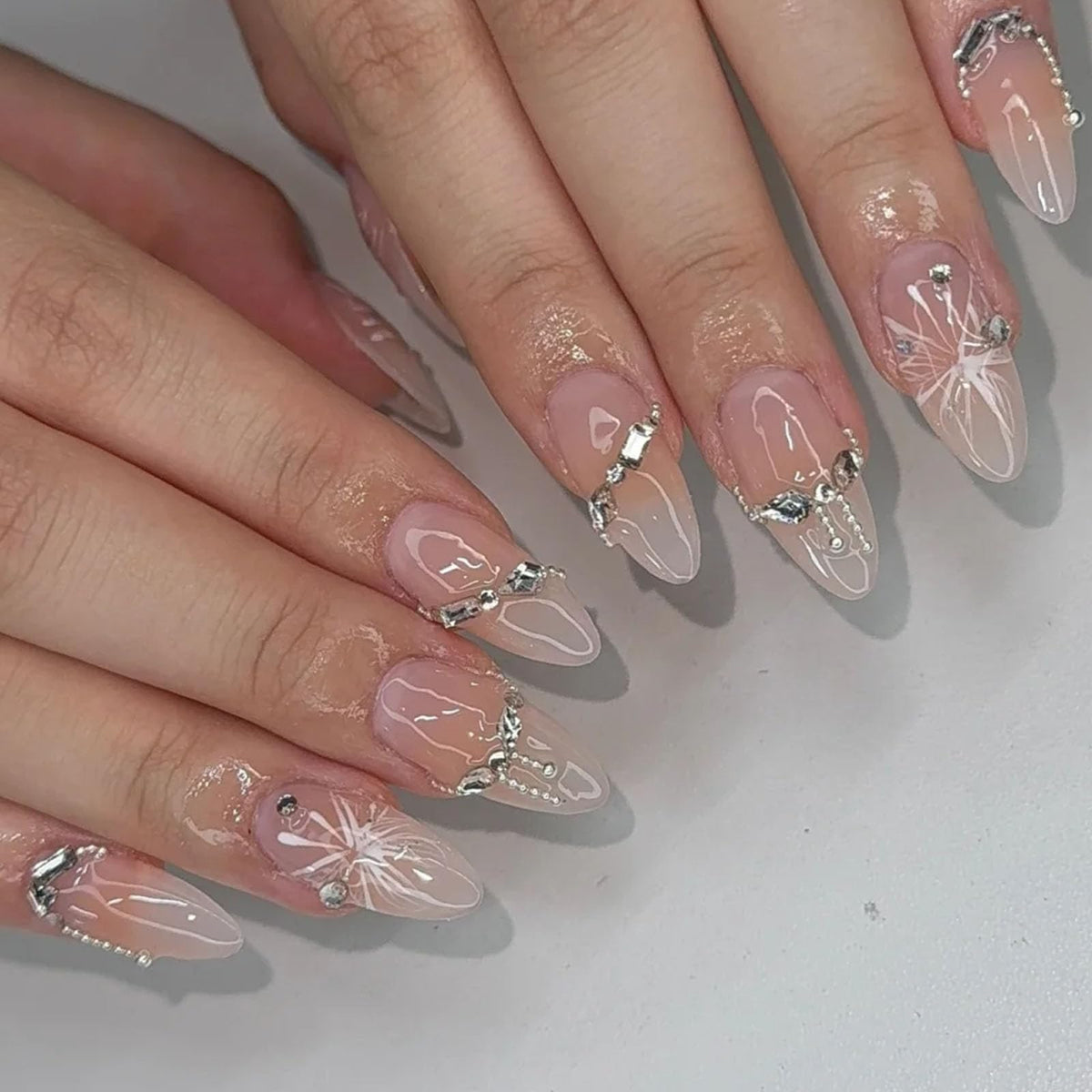 Spring Press on Nails Almond Medium Fake Nails with White Flower Designs French Tip Nails Press ons Light Green False Nails Glossy Glue on Nails Acrylic Nails Nude Stick on Nails for Women 24Pcs