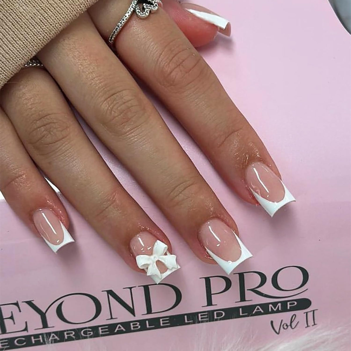 24 Pcs French Tip Press On Nails Long Coffin Almond Acrylic Full Cover Stick on Nails with Glitter Rhinestones Designs White Bow False Nails for Women Nail Art Decoration