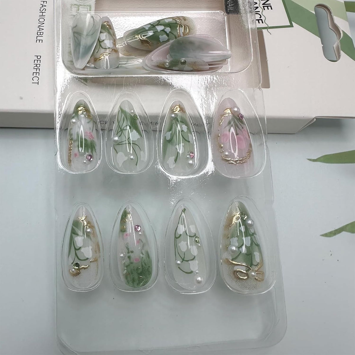 Green Press on Nails Medium Almond Fake Nails with 3D Pearl Rhinestones Designs Gold French Tips Flower Acrylic Nails False Nails White Floral Full Cover Glossy Stick on Nails for Women 24Pcs