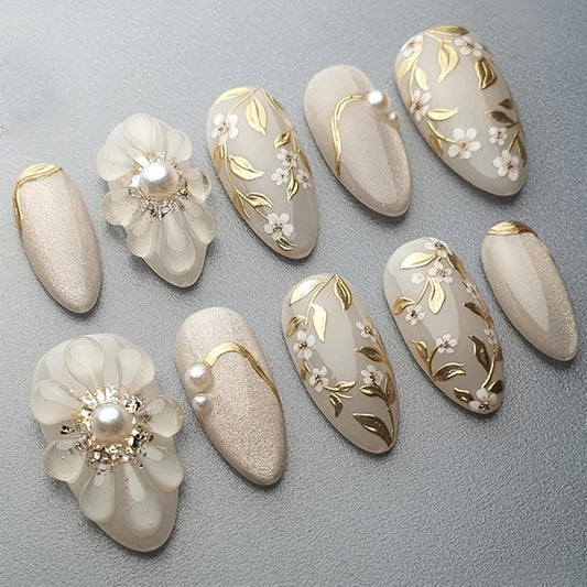 30Pcs Handmade Press on Nails Medium Almond Shape 3D Flower Fake Nails with Chrome Gold Foil Leaves Pearl Designs Nude White Shiny Acrylic Nails Reusable Full Cover Artificial False Nails for Women