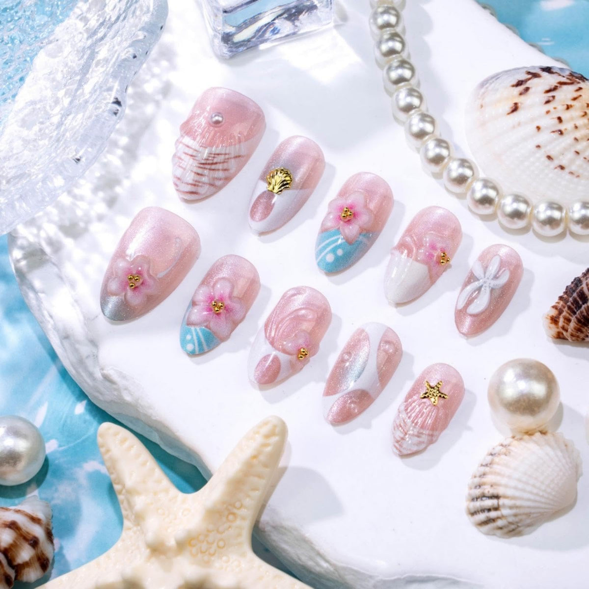 3D Handmade Pink Flower Press on Nails Blue French Tip Almond Fake Nails with Gold Metal Charms Luxury Reusable Full Cover Pink Acrylic Nails Press on for Women 24Pcs
