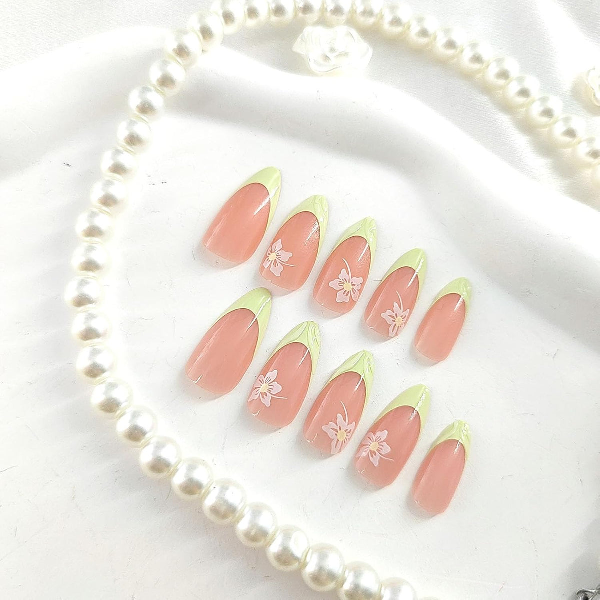 Spring Press on Nails Almond Medium Fake Nails with White Flower Designs French Tip Nails Press ons Light Green False Nails Glossy Glue on Nails Acrylic Nails Nude Stick on Nails for Women 24Pcs